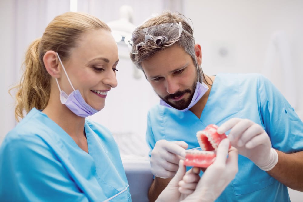 expert taking care of dentures